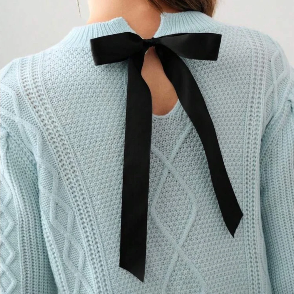 Elegant Light Blue Knit Sweater with Embellishments
